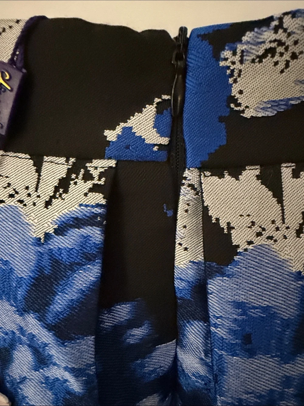 Chicwish Black Midi Skirt with Bold Blue and White Floral Print